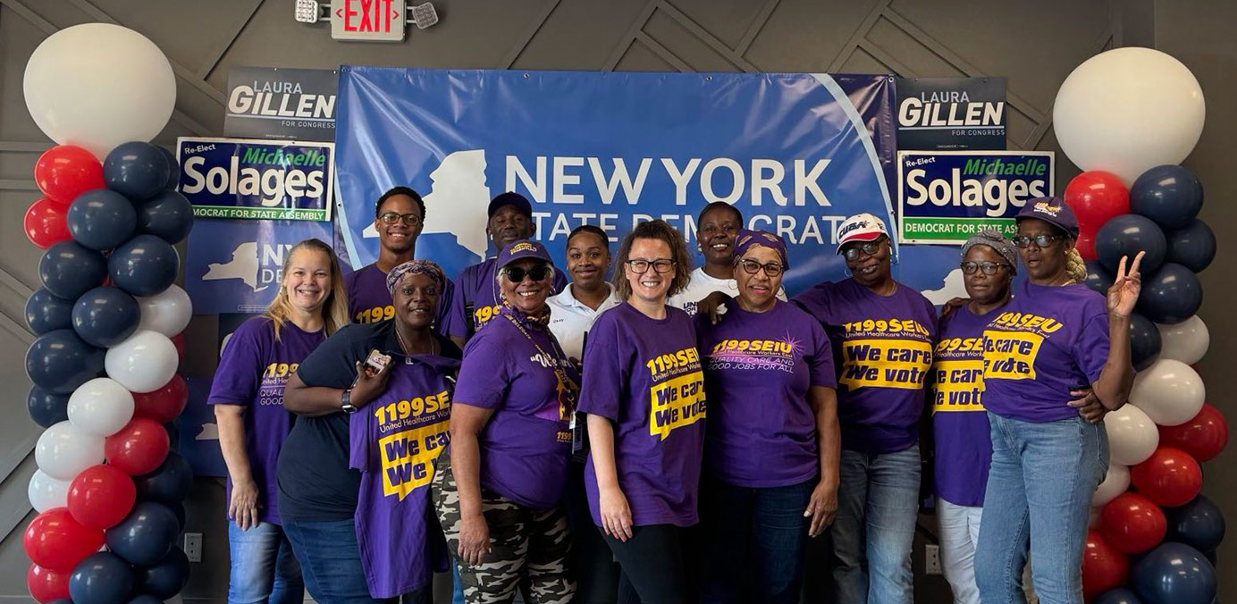 1199 SEIU volunteers with signs inside